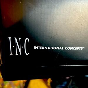 INC size 6 silver glitter boots.